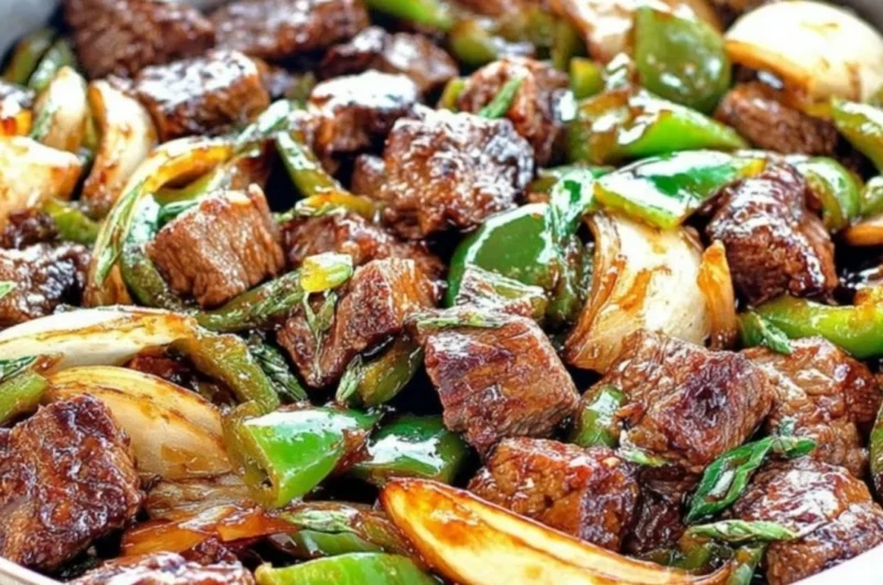 Better-than-takeout teriyaki steak bites with green pepper and onion served in a bowl