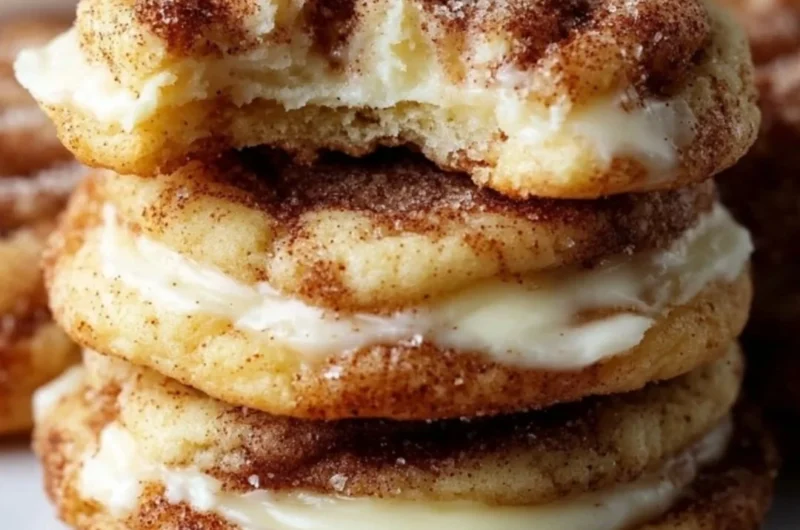 Cinnamon Roll Cheesecake Cookies with cream cheese frosting and cinnamon swirl