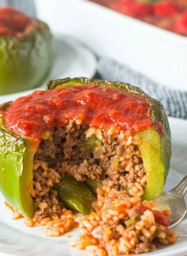 Classic stuffed peppers filled with savory ingredients, ready to enjoy.