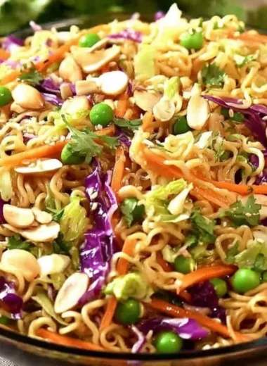 Bowl of crunchy Asian ramen noodle salad with vegetables and dressing
