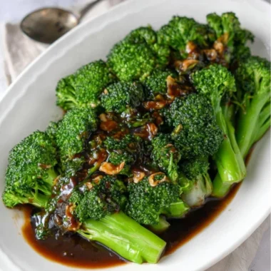 Plate of easy and delicious broccoli with garlic sauce cooked to perfection