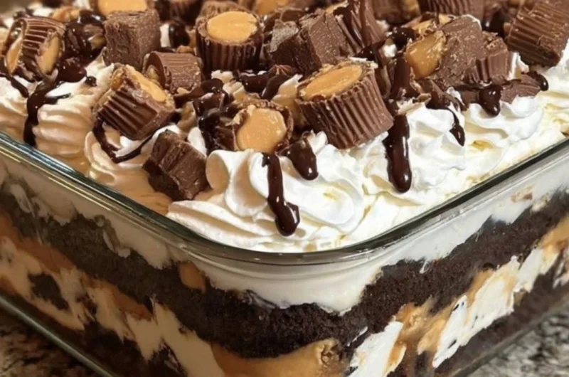 No-bake chocolate peanut butter mousse dessert topped with chocolate shavings.