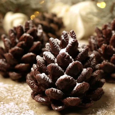 Delicious Vegan Pine Cone Truffles arranged on a rustic wooden table